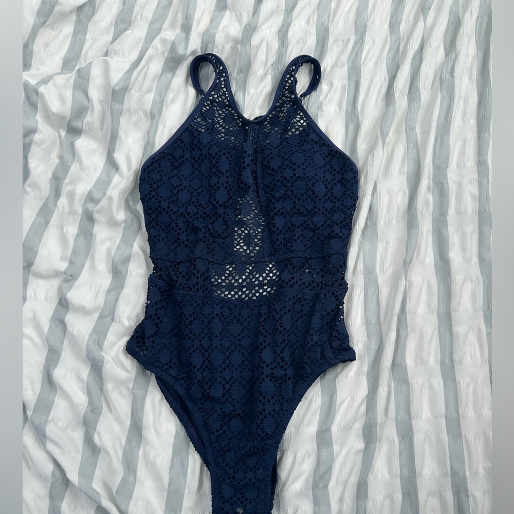 Size medium, for older children, younger teens, navy blue, worn a couple times